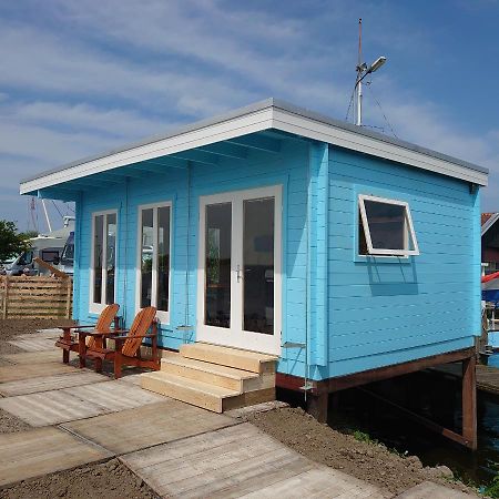 Waterhuisjes Op De Pier Van Lauwersmeerplezier! Lauwersoog Εξωτερικό φωτογραφία