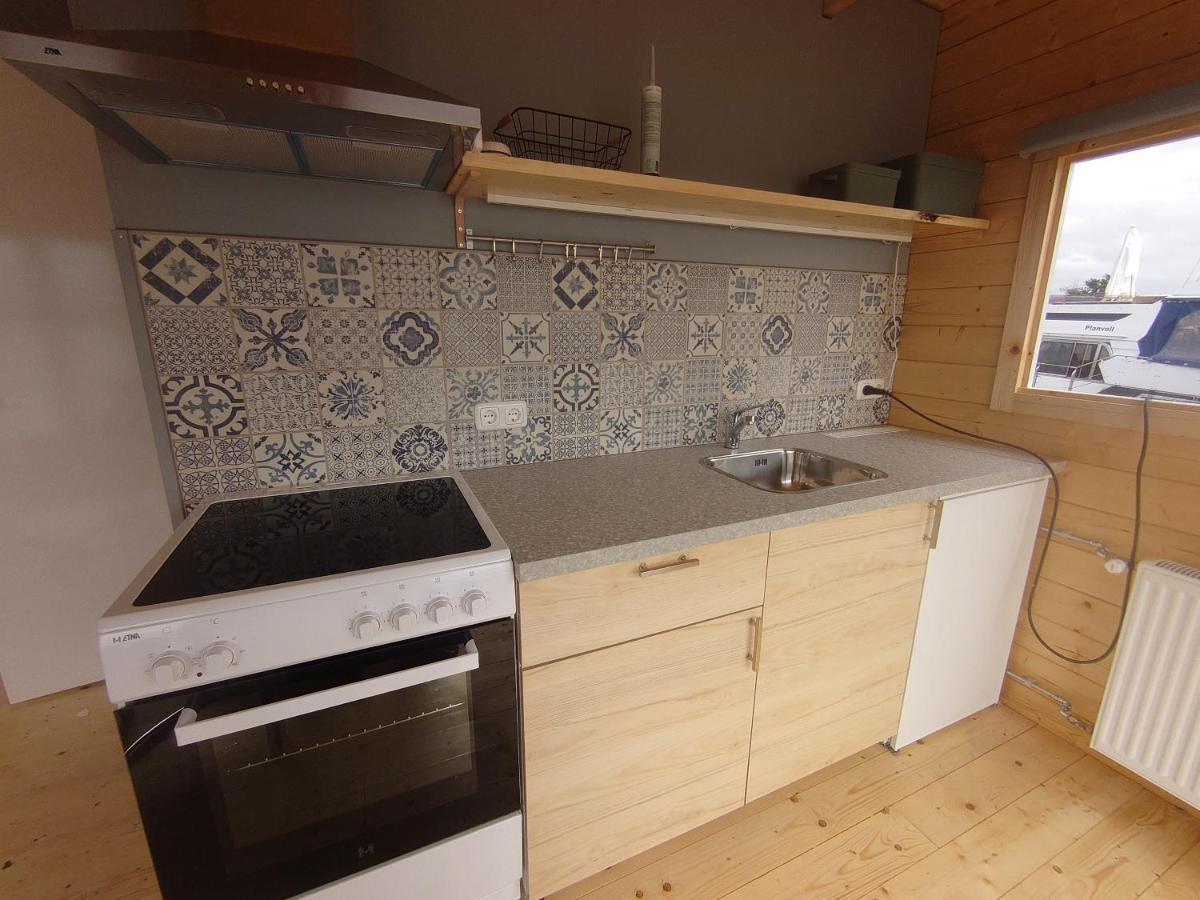 Waterhuisjes Op De Pier Van Lauwersmeerplezier! Lauwersoog Εξωτερικό φωτογραφία