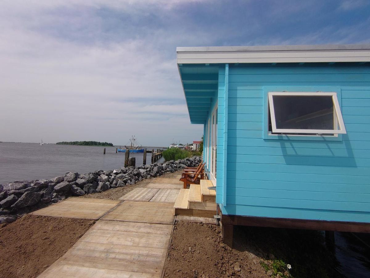 Waterhuisjes Op De Pier Van Lauwersmeerplezier! Lauwersoog Εξωτερικό φωτογραφία