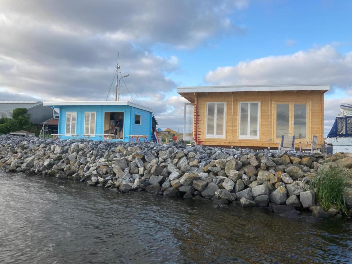 Waterhuisjes Op De Pier Van Lauwersmeerplezier! Lauwersoog Εξωτερικό φωτογραφία